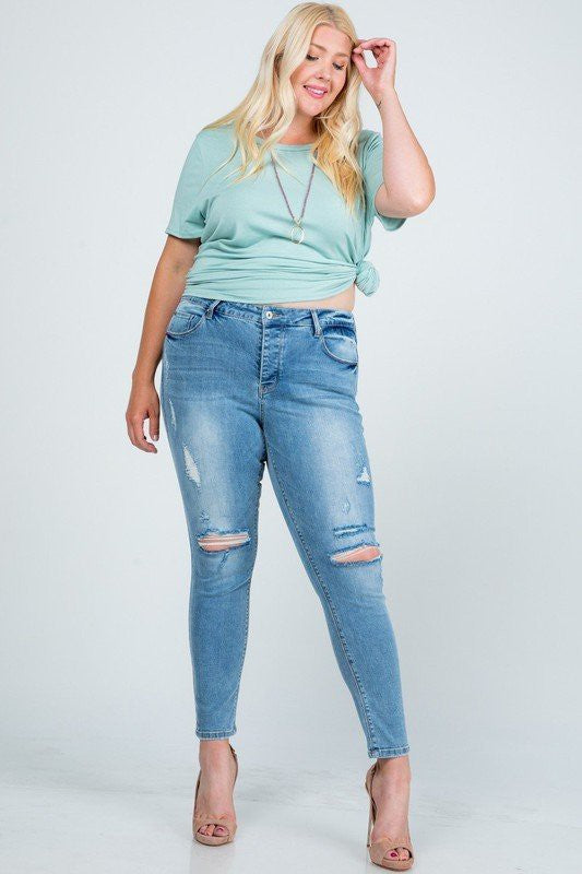 Mid Rise Distressed Skinny Jeans