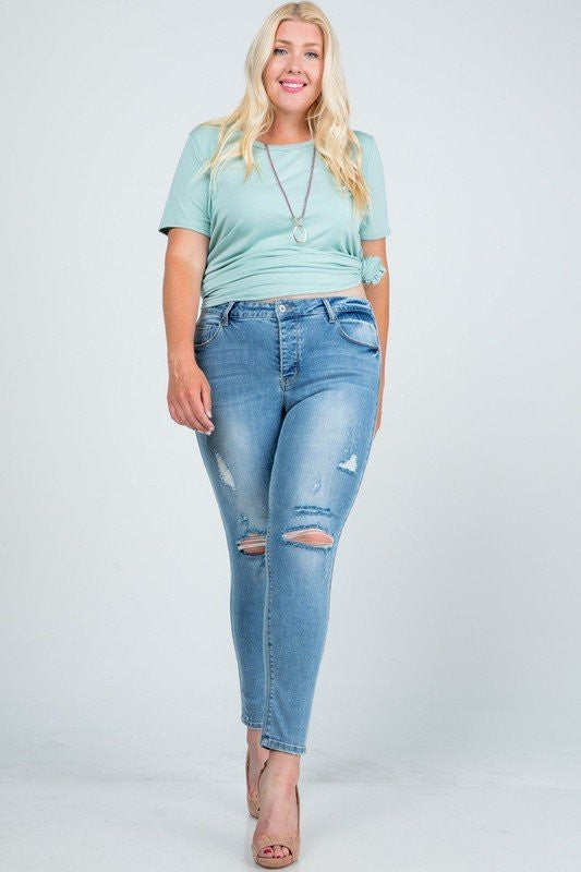Mid Rise Distressed Skinny Jeans