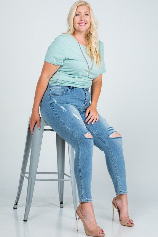 Mid Rise Distressed Skinny Jeans
