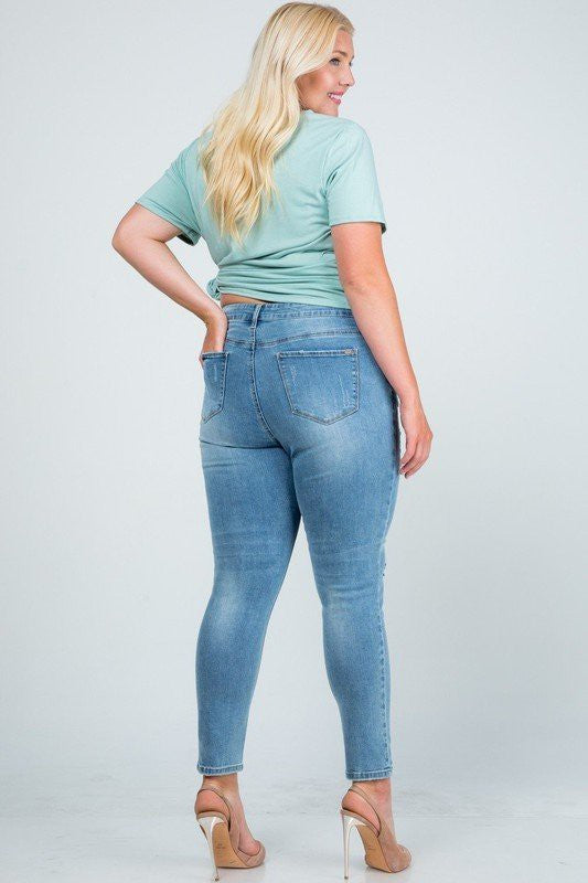 Mid Rise Distressed Skinny Jeans