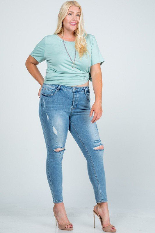 Mid Rise Distressed Skinny Jeans